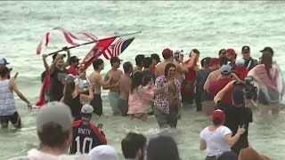 Matthew Tkachuk jumps into water with fans at Fort Lauderdale beach during PANTHERS victory parade