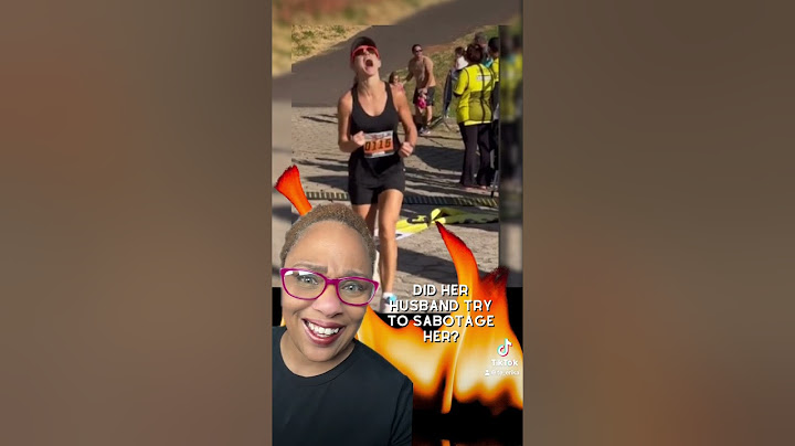 Husband interrupts wife at the FINISH LINE during her marathon