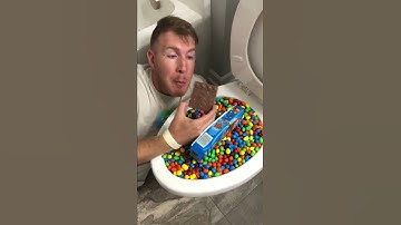 Thumbnail of Eating M&M's Chocolate Candy Bar in Toilet #shorts #asmr #food