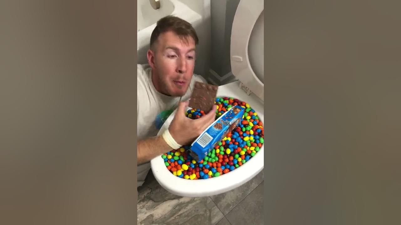 Eating M&M's Chocolate Candy Bar in Toilet #shorts #asmr #food