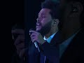 Ariana Grande and The Weeknd perform their song 