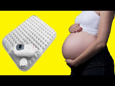 Video: Kan jeg bruke en varmepute mens jeg er gravid?