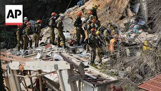 Emergency Workers Seen At Three Cities In Israel After Iran Missile Attacks