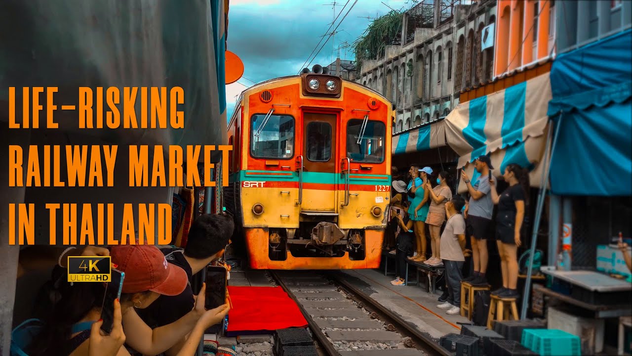 The LIFE-RISKING Railway Market in Thailand! | 4K |