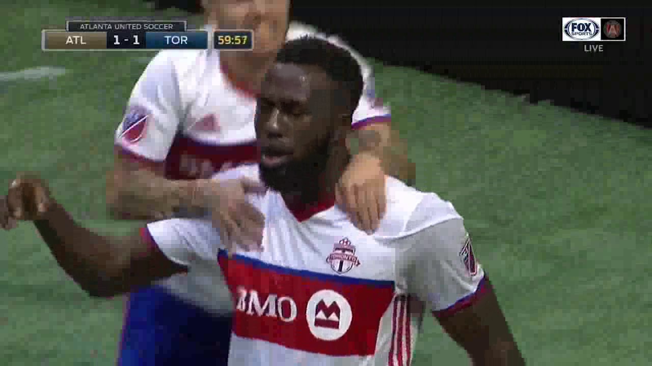 Altidore scores. Fan throws beer. Giovinco drinks it - MLS
