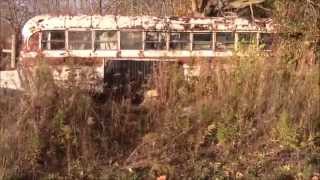 Old Bus Converted RV in scrap yard Old Bus Converted RV in scrap yard