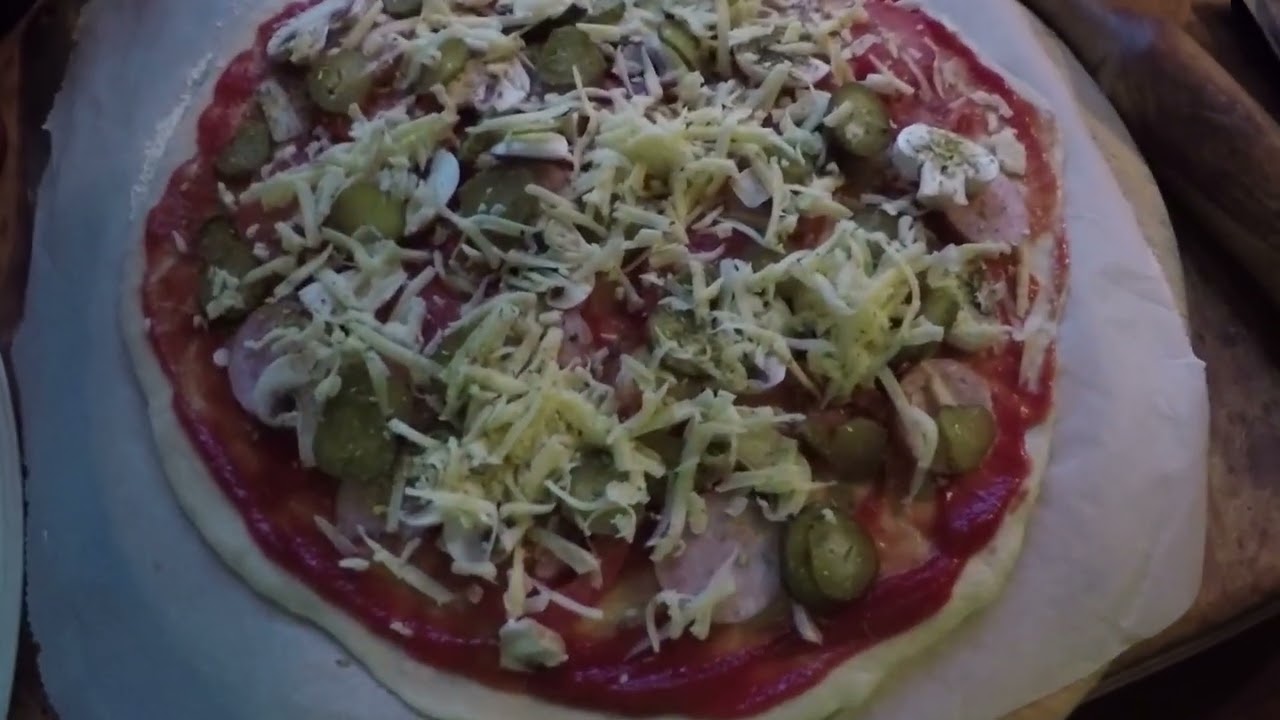 Pizza, wheat and  rye bread in a Pompeian oven