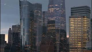 Luminous Lower Manhattan skyline glowing with business district skyscrapers illuminating darkening