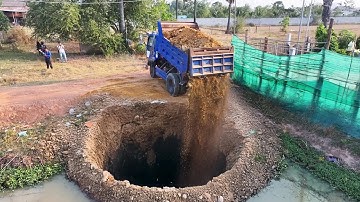 New project uses MITSUBISHI BD2f bulldozer to push soil into pond water
