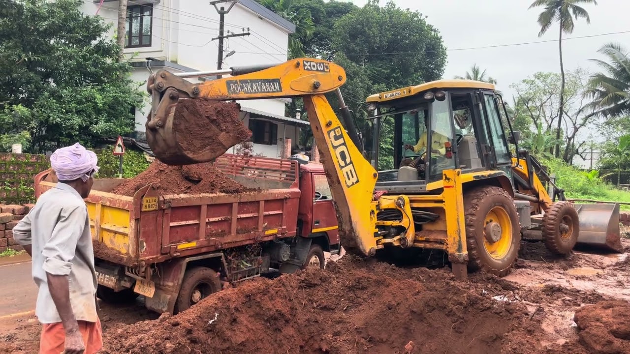 Loading soil / debris into tipper