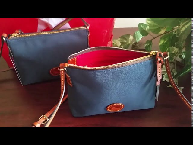 Dooney & Bourke: Crossbody Pouchette in the color Navy & Nylon