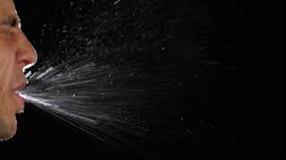 how sneez looks like Man sneezing with dark background screenshot 4