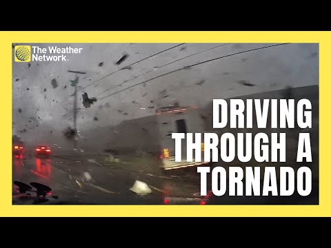 See It: The Terrifying Moment a Car Drives Through Tennessee tornado