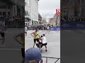 Boston Marathon Runners Help Competitor Finish Race After He Collapses