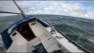 CH 23: Solo sailing to the Isle of Man in rough sees, water over the bow and a wet vberth.