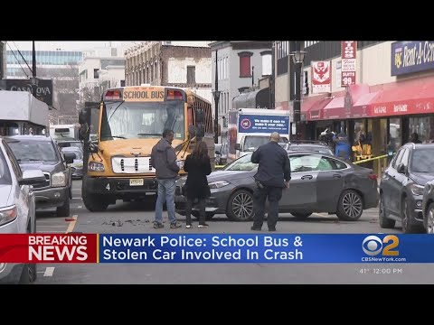 Newark school bus collides with stolen car