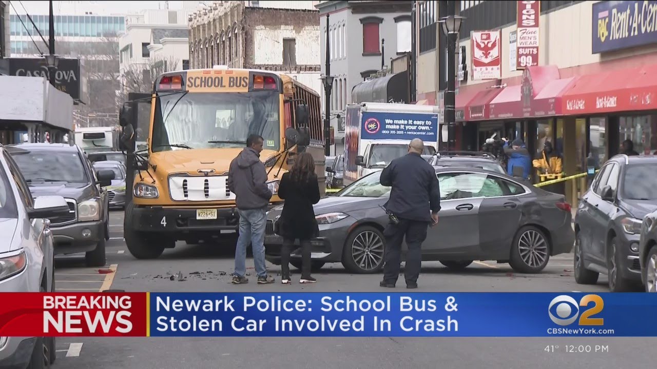 Newark school bus collides with stolen car - YouTube