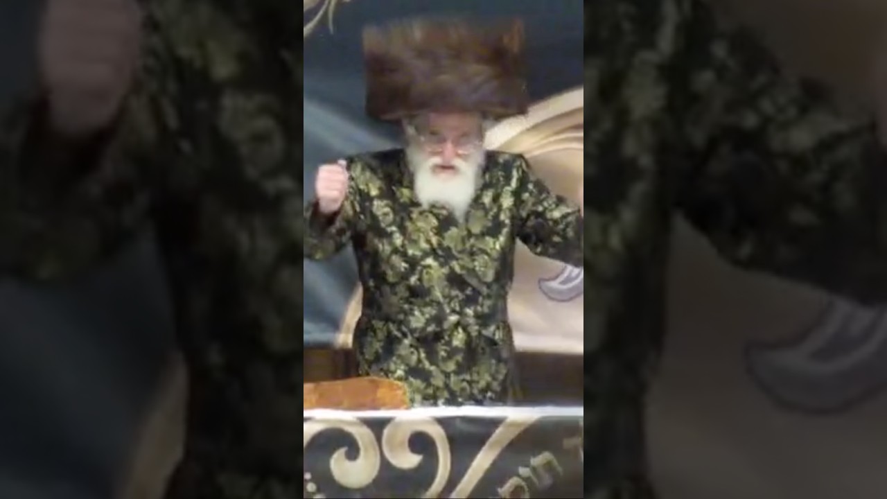 האדמו״ר מויז׳ניץ בריקוד במעמד הכנסת ספר תורה בלונדון