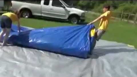 How to roll up an inflatable jump slide combo