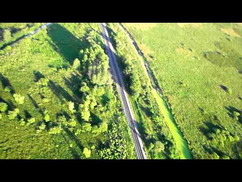 View of where the Winnebago county ghost town of Medina Junction used to be, from above via a RC airplane. View of the WIOUWASH trail, Poygan Marsh, Rat River, and the east west Wisconsin Central / Canadian National railroad line through the area. I sure would have liked it if a train went through to get in the video, oh well, I'll try again for that.