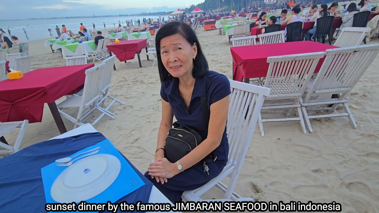 sunset seafoods dinner at the famous JIMBARAN beach in bali indonesia.