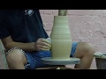 Pottery throwing demonstration by Guy Jana