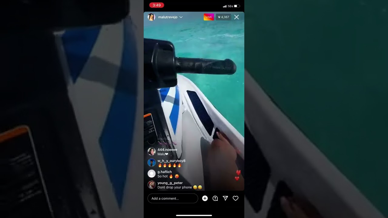 Malu trevejo riding a jet ski on ig live.