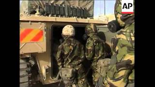 UK troops practise NBC suit drills