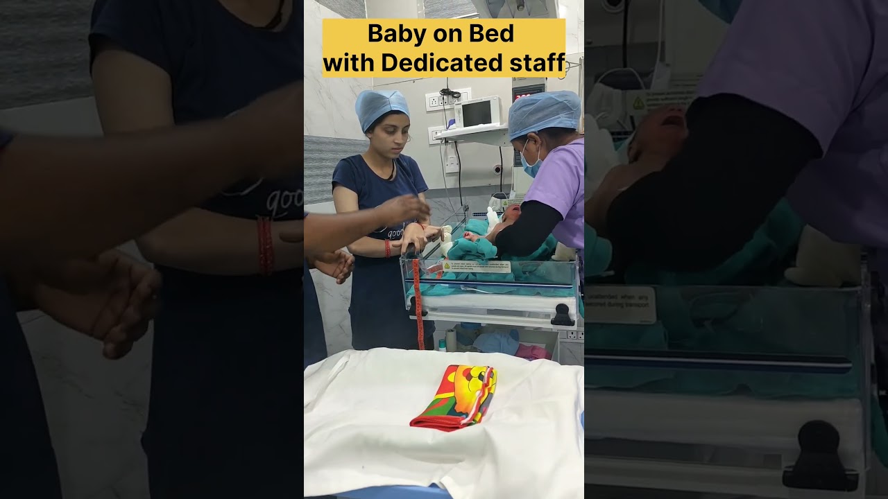 Baby on Bed with Dedicated staff 