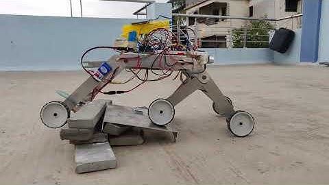 Rocker Bogie Mechanism Overcoming Obstacles