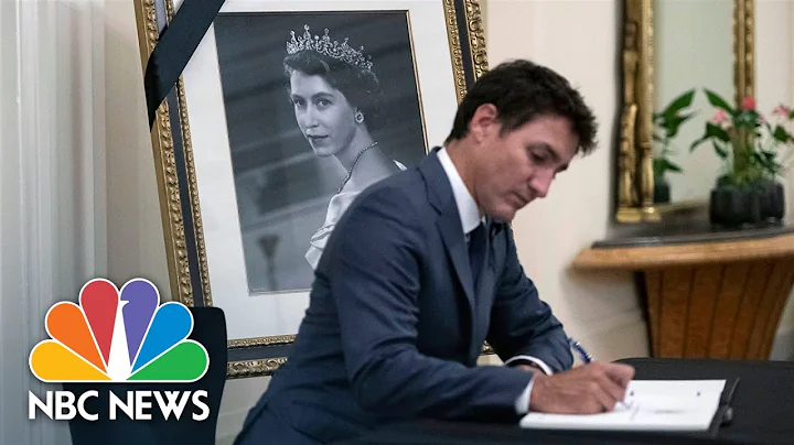 Canadian Prime Minister Trudeau Signs Book Of Cond...