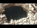 بالفيديو والصور.. : جبال متفحمة ومبانٍ هالكة.. شاهد ماخلفته "أم القنابل" بشبكة أنفاق "داعش" في أفغانستان!