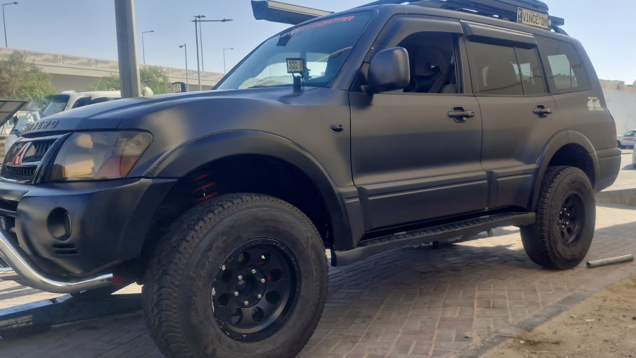 installing Aluminum lift spacer and 285/75/R16 Torque AT tyres on my Pajero...