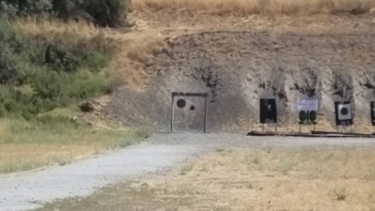 45 Raptor smacking a 20lb AR500 plate