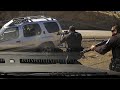NMSP shoot suspect after he shot a woman at a restaurant and pointed a rifle at officers