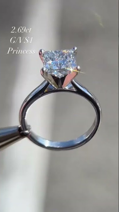 Elegant engagement ring with over 2.5 carat princess cut diamond