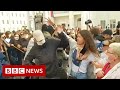 Belarus protests: Women try to unmask those detaining protesters - BBC News