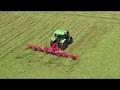 Kuhn gf 8712  10812 t  p  mounted  trailed gyrotedders in action