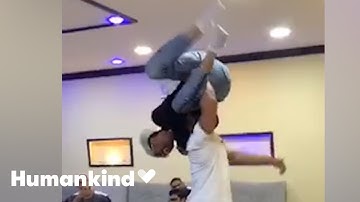 Friends wrap man in bear hug in this epic reunion | Humankind