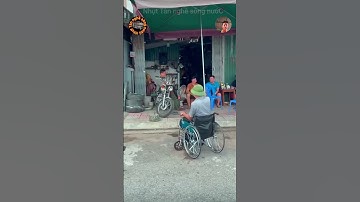 Xe máy kim xe lăn cho người khuyết tật