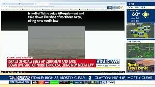 Israeli officials seize AP equipment and take down live shot of northern Gaza, citing new media law