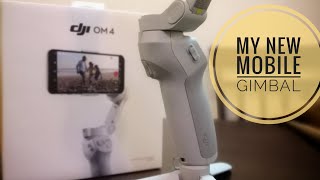 كشف غطاء ومحتويات مانع الاهتزاز دي جي اي اوزمو موبايل Unboxing DJI osmo mobile 4