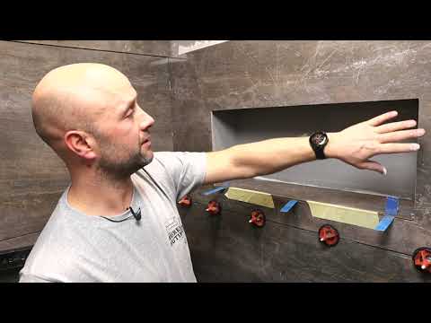 Video: Hvordan monterer du en kjededørlukker?