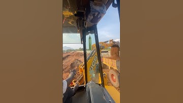 JCB 3DX Backhoe loader doing loading the soil to Mahindra 585 DI