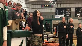 Brazilian exchange student wows crowd with National Anthem before Reeths-Puffer basketball game