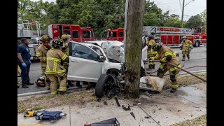 Jacksonville Fire Rescue Department responds to car vs pole with 2 trapped