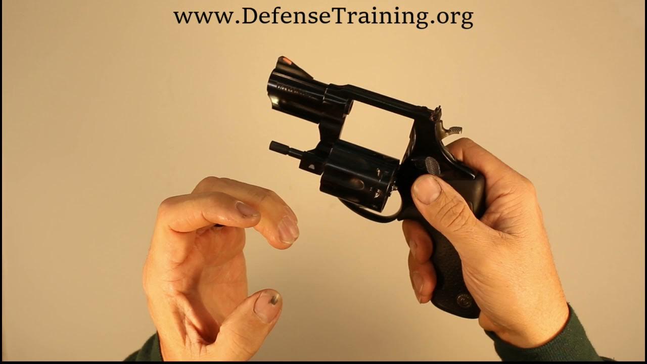 loading and unloading a revolver - YouTube