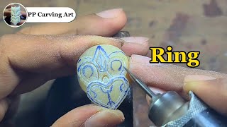 Tiki ring carving about bones. #art #woodworking #ring