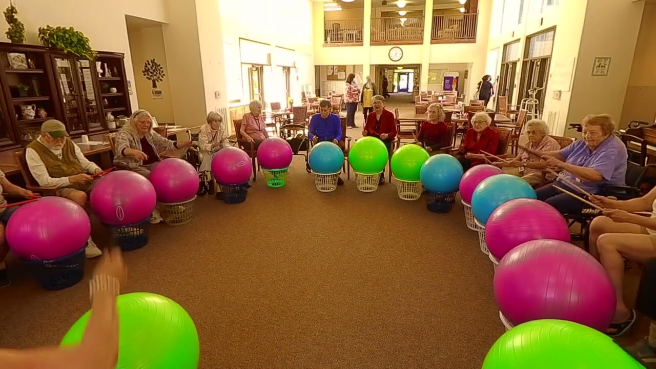 Octopus RhythmWorks Yoga ball drumming Bayberry Commons, an assisted