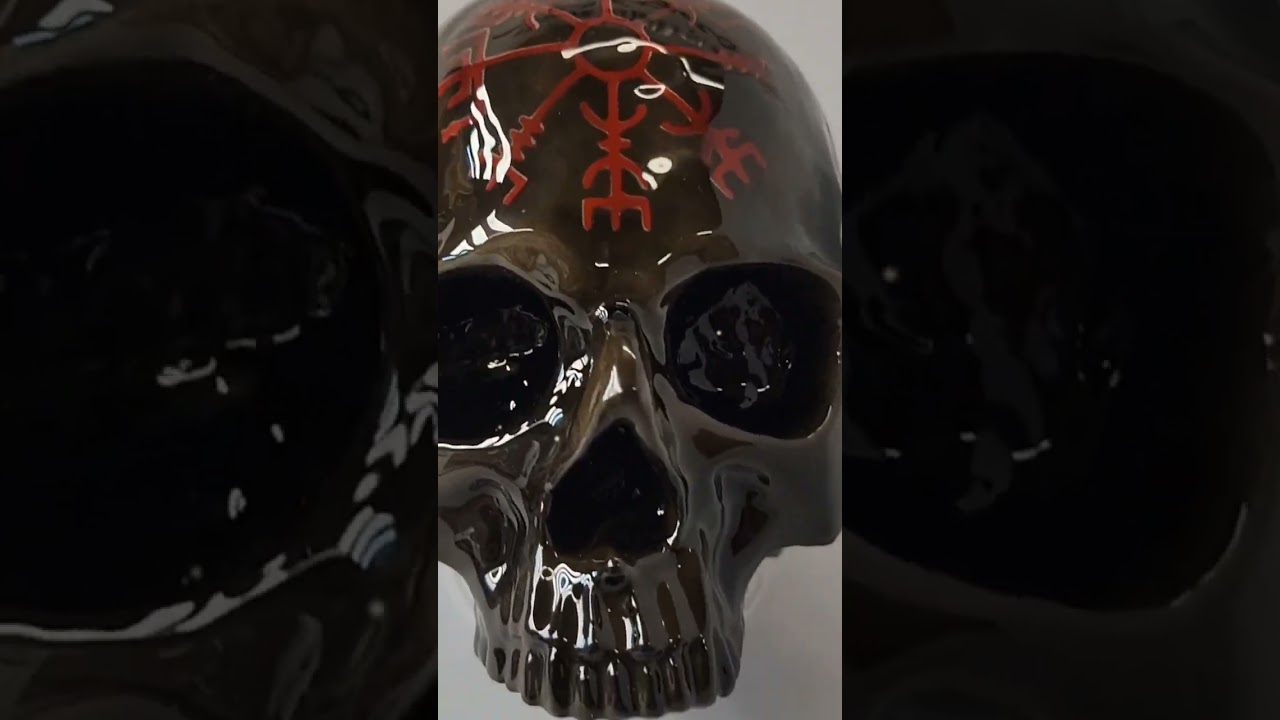 Ancient skull horn cover with burnt theme.  